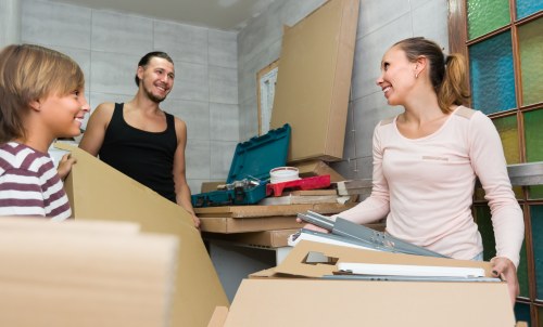 Securely arranged boxes and furniture inside a van