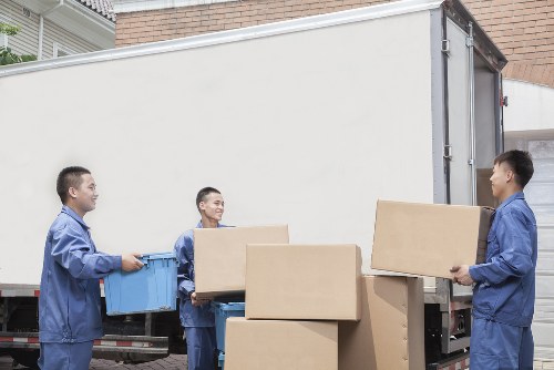 Professional handling of a grand piano during transport