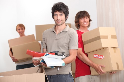Packed boxes and furniture ready for apartment removals