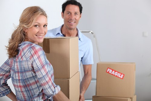 Trained removal staff handling furniture carefully