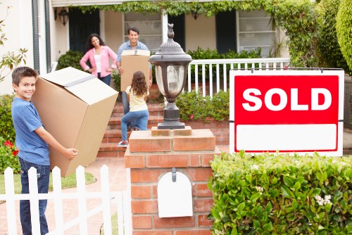 Local packing team handling fragile items during an Edgware relocation